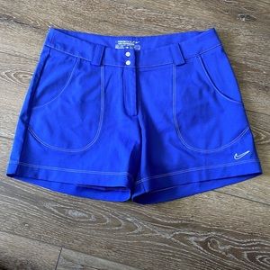 NIKE GOLF purple shorts with white stitching